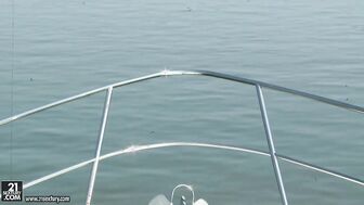 A boat, two guys and a willing blonde.