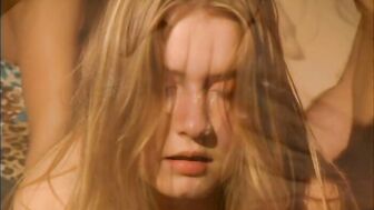 Sugar Babe and her friend Sophie Evans are together in this scene where the blonde is asked to strip naked by an unseen man.