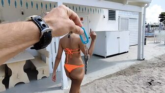 She takes me to the toilet of the beach ban to have her arsehole opened, then she jerks me off until I spunk